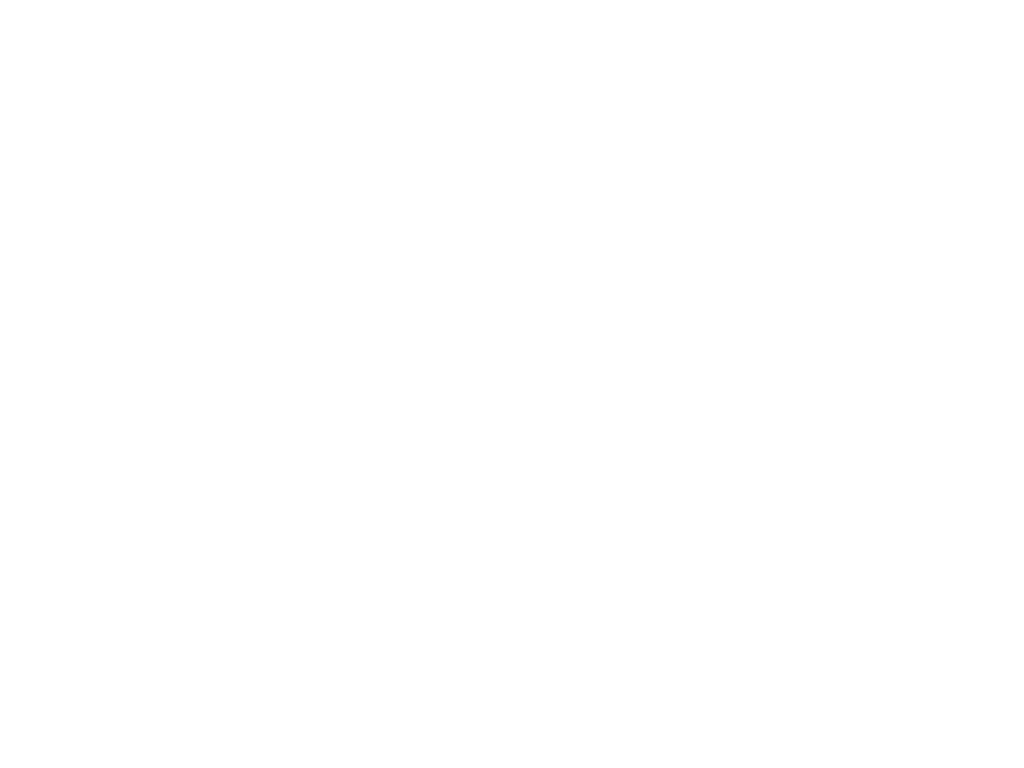 A woman sits on a chair and reads books